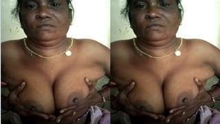 Auntie from the country flaunts her breasts