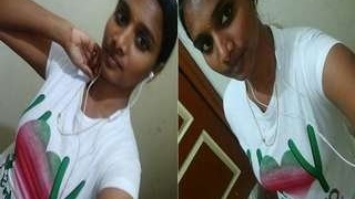 Watch a cute Tamil girl flaunt her breasts in a video call
