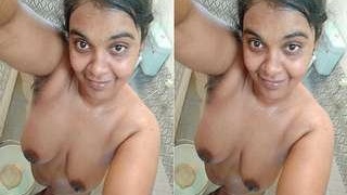 Young woman indulges in nude selfies for her partner