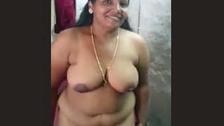 Lush Tamil auntie seductively strips down