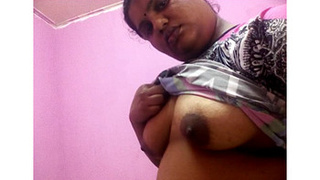 Indian aunty flaunts her breasts to her husband in a steamy video