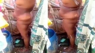 Tamil wife bathes in captivity with her husband