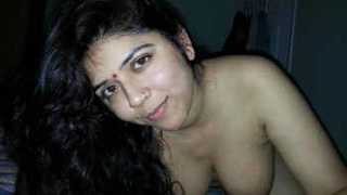 Indian wife gives her husband a blowjob in bed