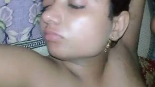 Beautiful young couple shares intimate moments on camera