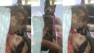 Mature couple has sex in a car