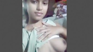 Horny teen shows off her big boobs and pussy in a solo video