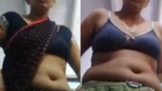 Desi auntie strips down to reveal her big navel