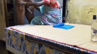 Indian maid gives a handjob and gets a load of cum