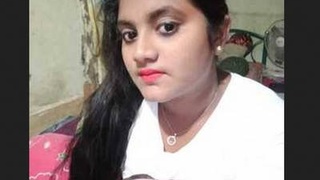 Indian girl flaunts her large breasts in a video