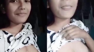 Young college girl flaunts her petite breasts in a steamy video