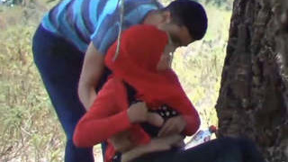 Arab couple enjoys outdoor smooch and boob play