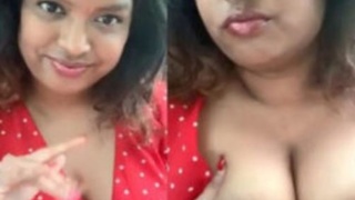 Busty girl reveals her curves in a car by the beach