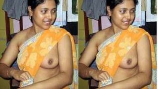 Desi girl with small boobs teases in a tank top and pleasures herself