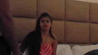 Young couple checks into hotel room for steamy sex