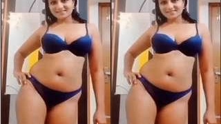Lingerie-clad model teases in a sultry bikini