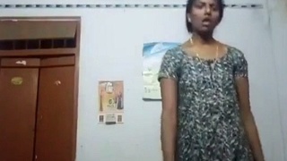 Tamil auntie's sensual striptease in a video