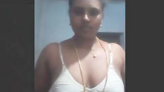 Explore Bhabha's tantalizing breasts and pussy in a live video