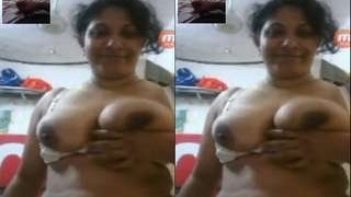 Lankan bhabhi flaunts her big tits and shaved pussy