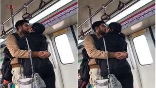 Indian couple kissing on the metro