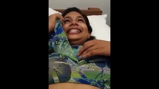 Watch a stunning Tamil wife pleasure herself with her fingers in this steamy video