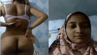 Adorable Indian babe flaunts her butt in front of camera