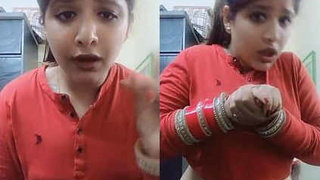 Chubby girl with a big open navel gets naughty on camera