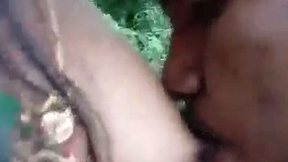 Outdoor sex video of a couple enjoying boobs sucking and tits play