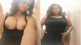 Exclusive video of a busty Indian amateur showing off her assets