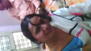 Aunt poses for friend in front of husband