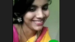 A stunning Indian woman pleasures herself in a video call