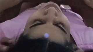 Watch a couple get naughty in bed in this home video