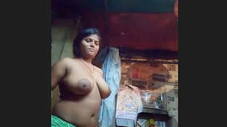 Boudi flaunts her ample bosom for your viewing pleasure