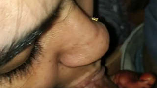 Bhabhi's skilled hand gives a perfect blowjob