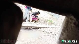 Young Indian girl in a sari knows she's being watched in her XXX video of peeing