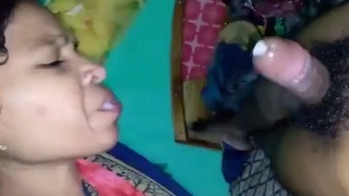 Bhabhi takes a load in her mouth and swallows it