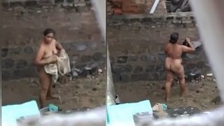 Watch as a naked Desi woman gets caught on camera while swimming in the sun