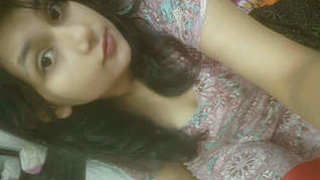Cute Desi teen shows off her boobs in homemade video