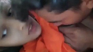 Indian teen lovers indulge in boob sucking on the couch