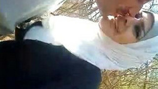 Arab girl pleasures herself outdoors and sucks on a cock