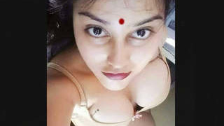 Indian babe with big boobs and a tight pussy gets naughty on camera