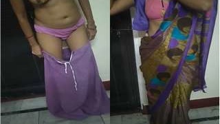 Exclusive video of a desi bhabhi stripping and flaunting her boobs and pussy