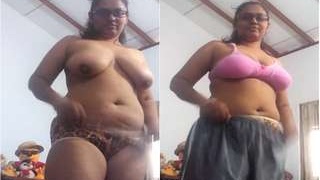 Exclusive video of a sexy bhabhi exposing her big boobs and pussy