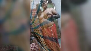 Desi wife in village gets caught on camera while flashing her big boobs