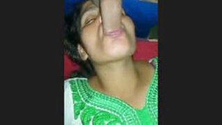 Bhabhi gives a blowjob to her husband's fat dick and gets fucked