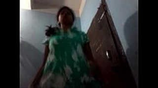 Watch a cute Indian teen undress in this video