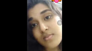 Adorable naked Indian girl flaunts her curves
