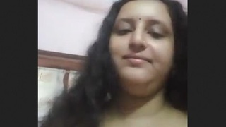 Busty bhabhi flaunts her pussy and breasts in a steamy video