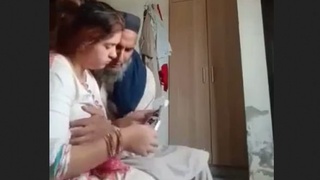 Paki grandpa enjoys a young babe's clear conversation in this video
