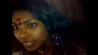 Watch a Tamil wife with a hairy pussy get naughty on camera