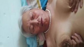 Saggy-breasted Chinese prostitute in action